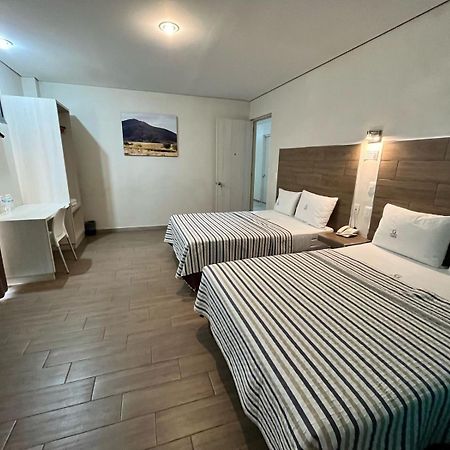 Hotel Guiva Aeropuerto Oaxaca ภายนอก รูปภาพ