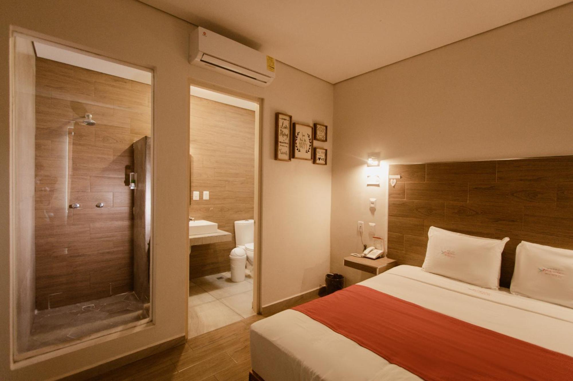 Hotel Guiva Aeropuerto Oaxaca ภายนอก รูปภาพ