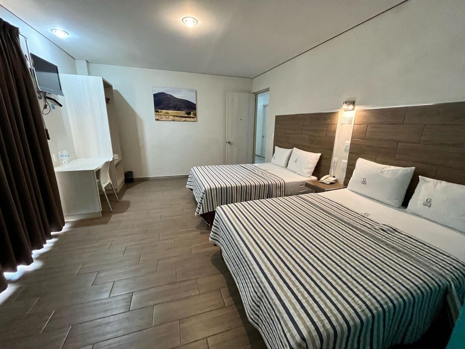 Hotel Guiva Aeropuerto Oaxaca ภายนอก รูปภาพ