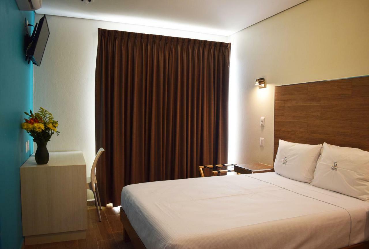 Hotel Guiva Aeropuerto Oaxaca ภายนอก รูปภาพ